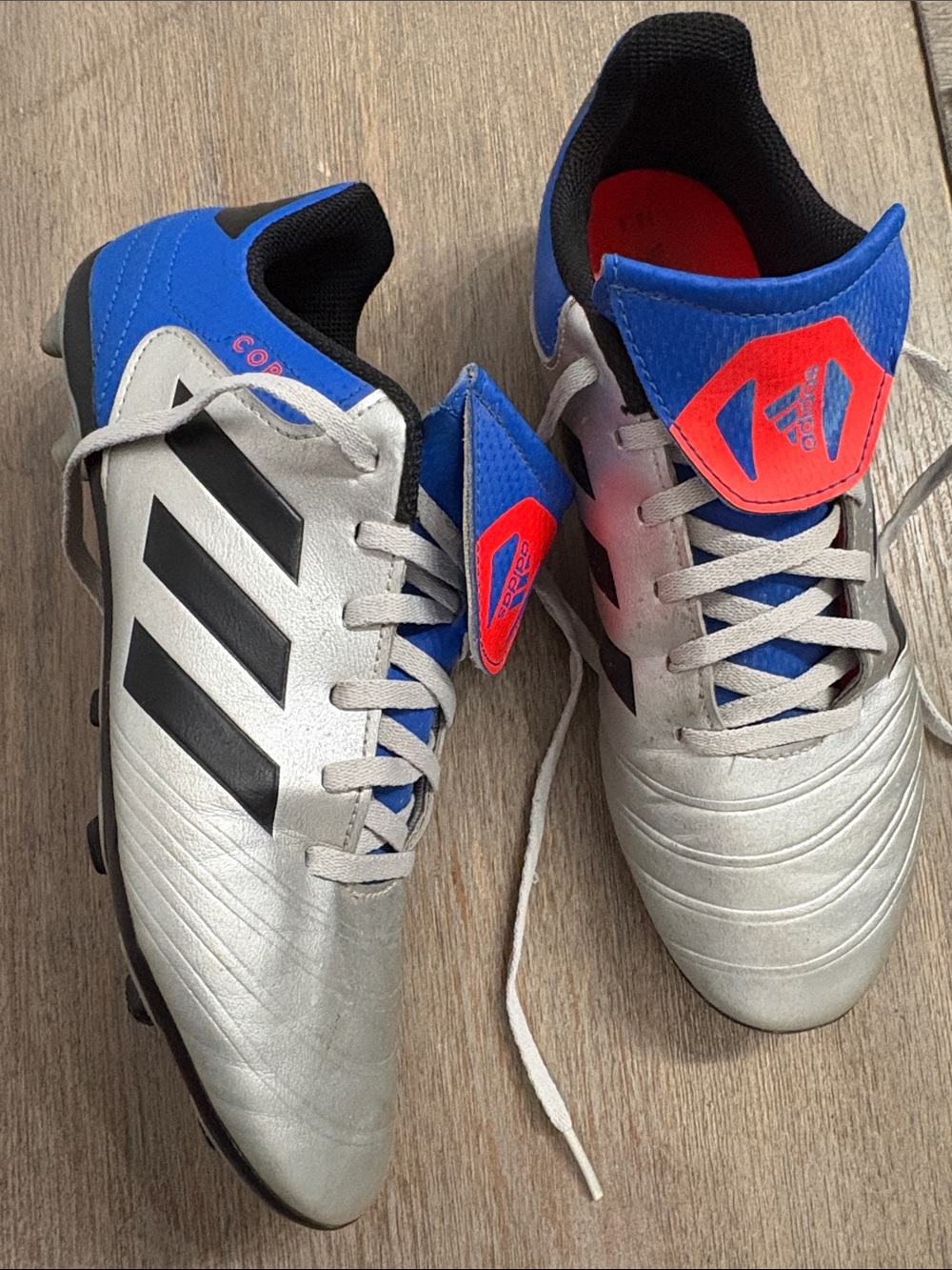 adidas size 6 Firm-Ground Soccer Cleats with Red-Orange Accents